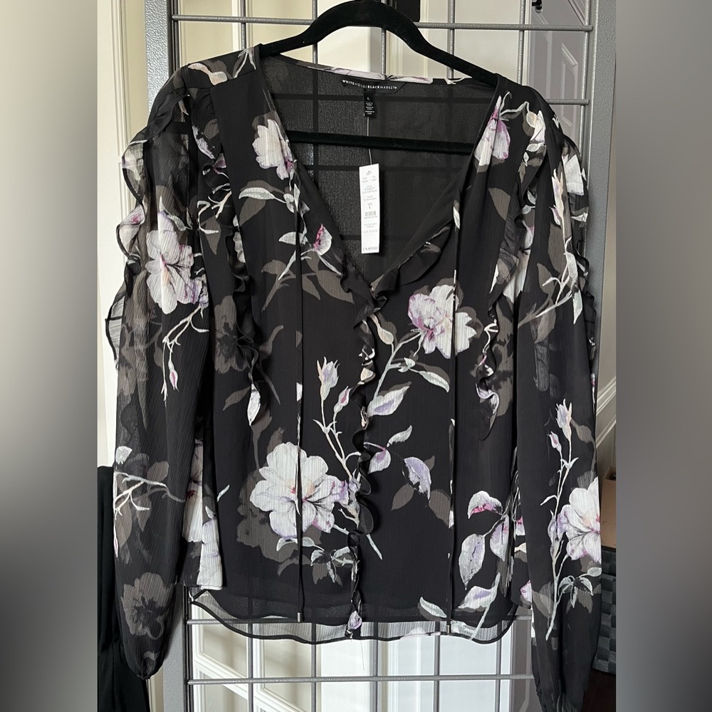WHBM NWT Blouse Size L long sleeve black floral with tie at the neck.